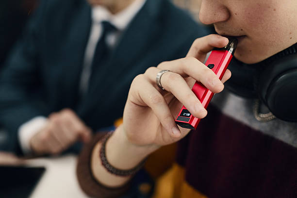 Modern disposable vape display in retail smoke shop setting
